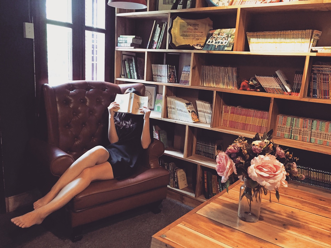 young woman reading, thinking quietly