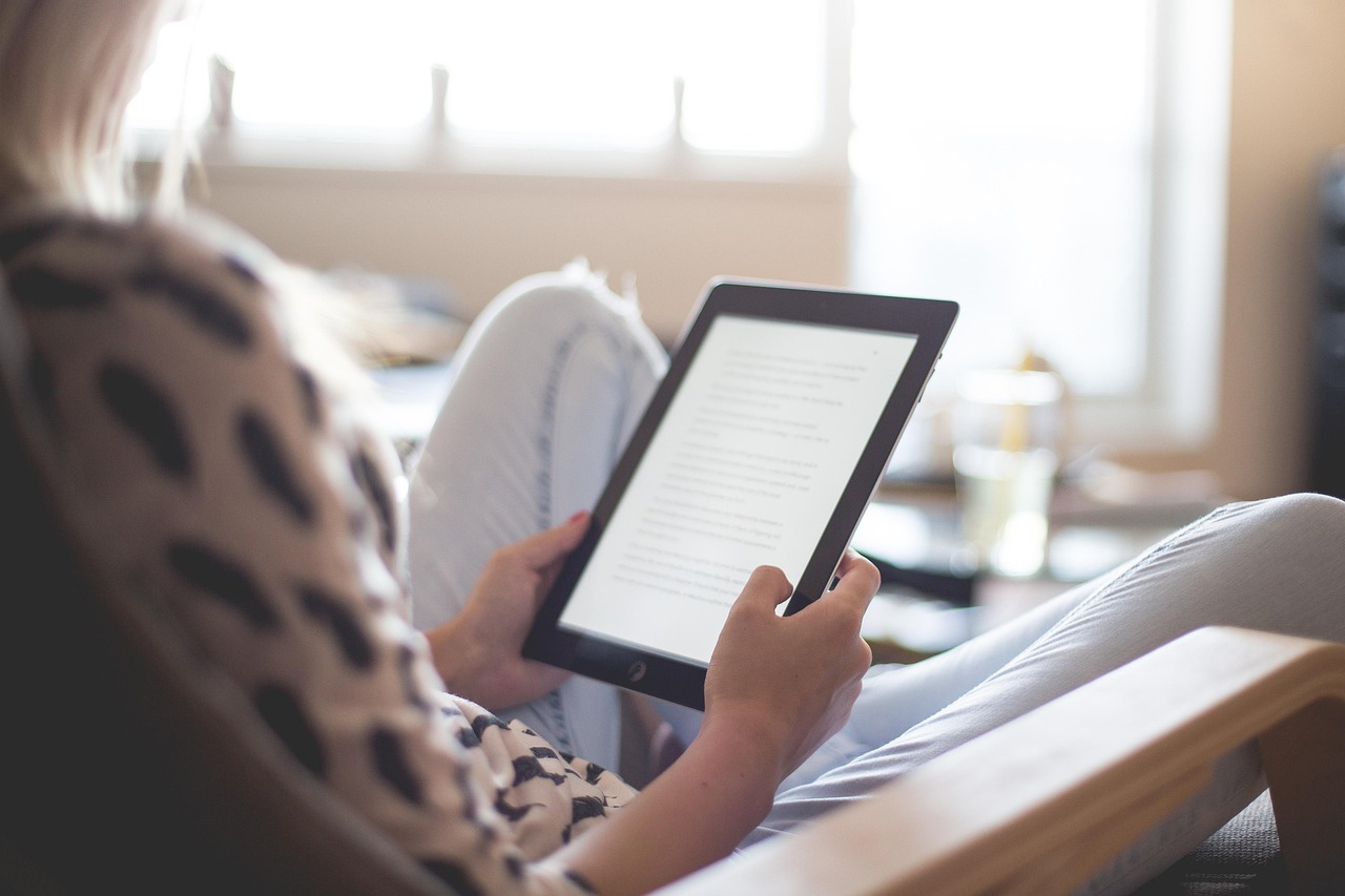young woman reading, thinking quietly